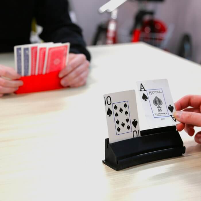 Playing card holder in use